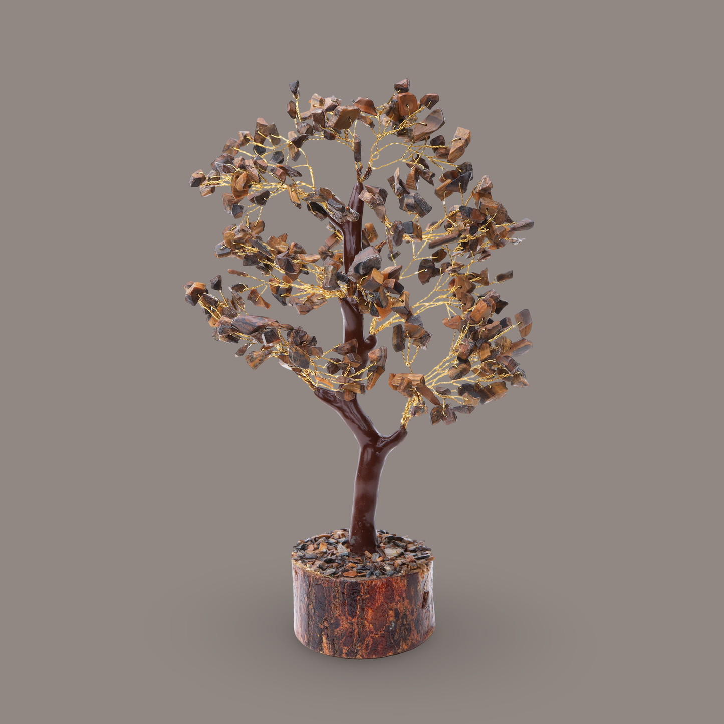 Decorative Tiger's Eye crystal tree with gold wire branches.
