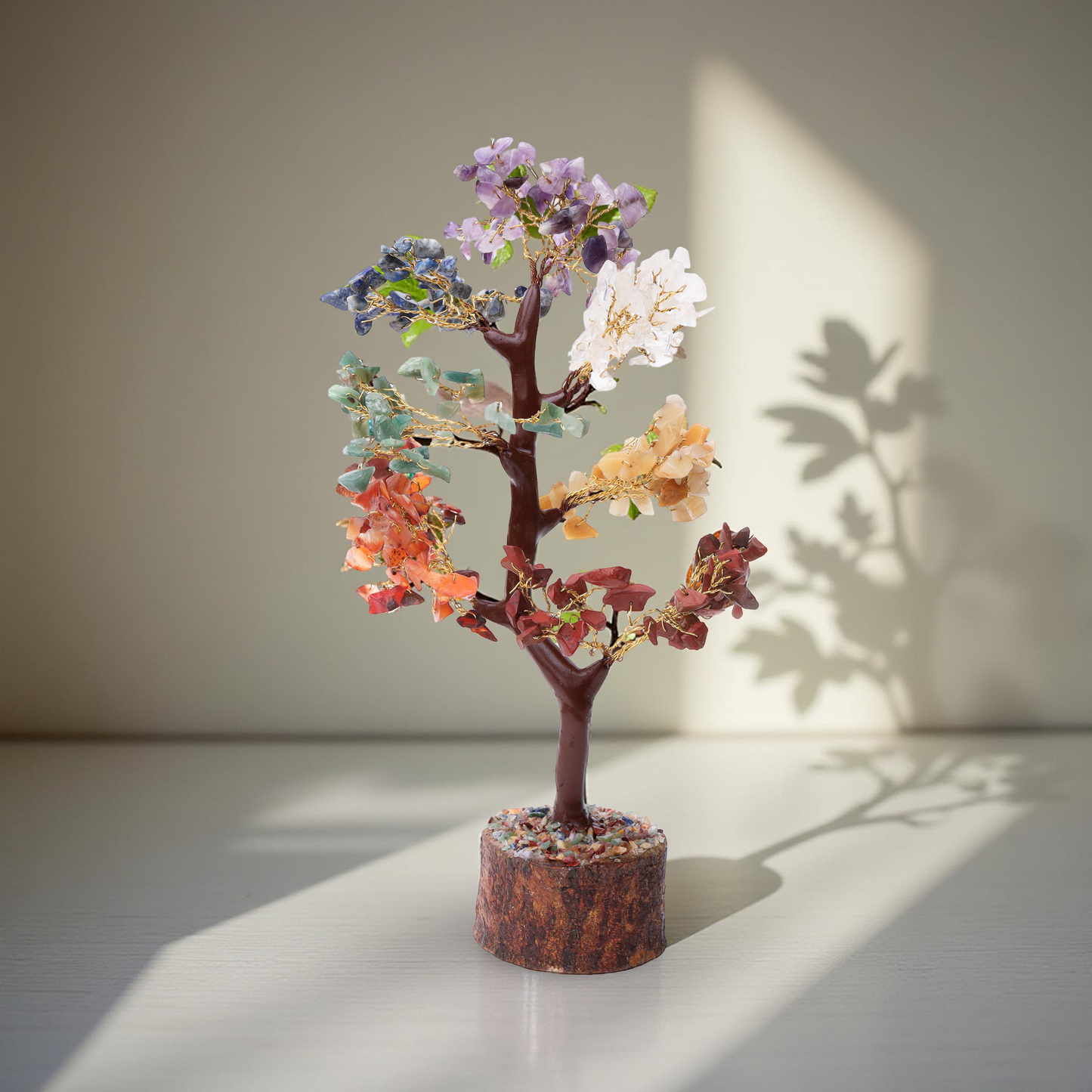 Artisanal multi-gemstone wish tree for home decor, featuring a cosmic galaxy background.
