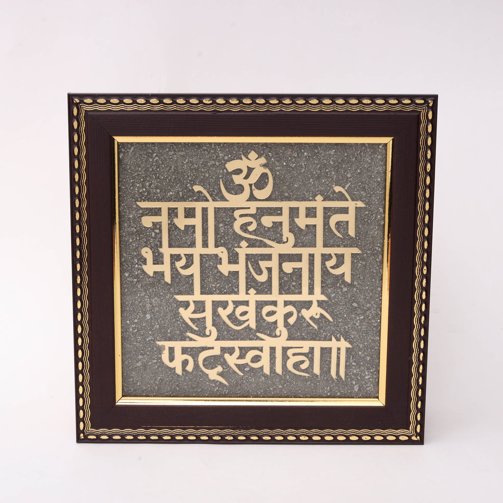 AstroViz gold-tone Sri Yantra and Om motifs on textured grey stone background in ornate dark wood frame