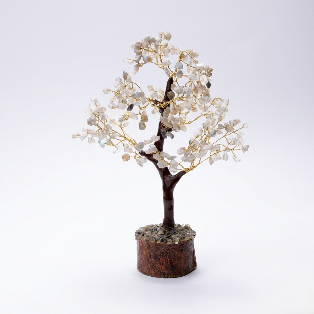 Crystal chip bonsai tree on wood base surrounded by amethyst and aquamarine
